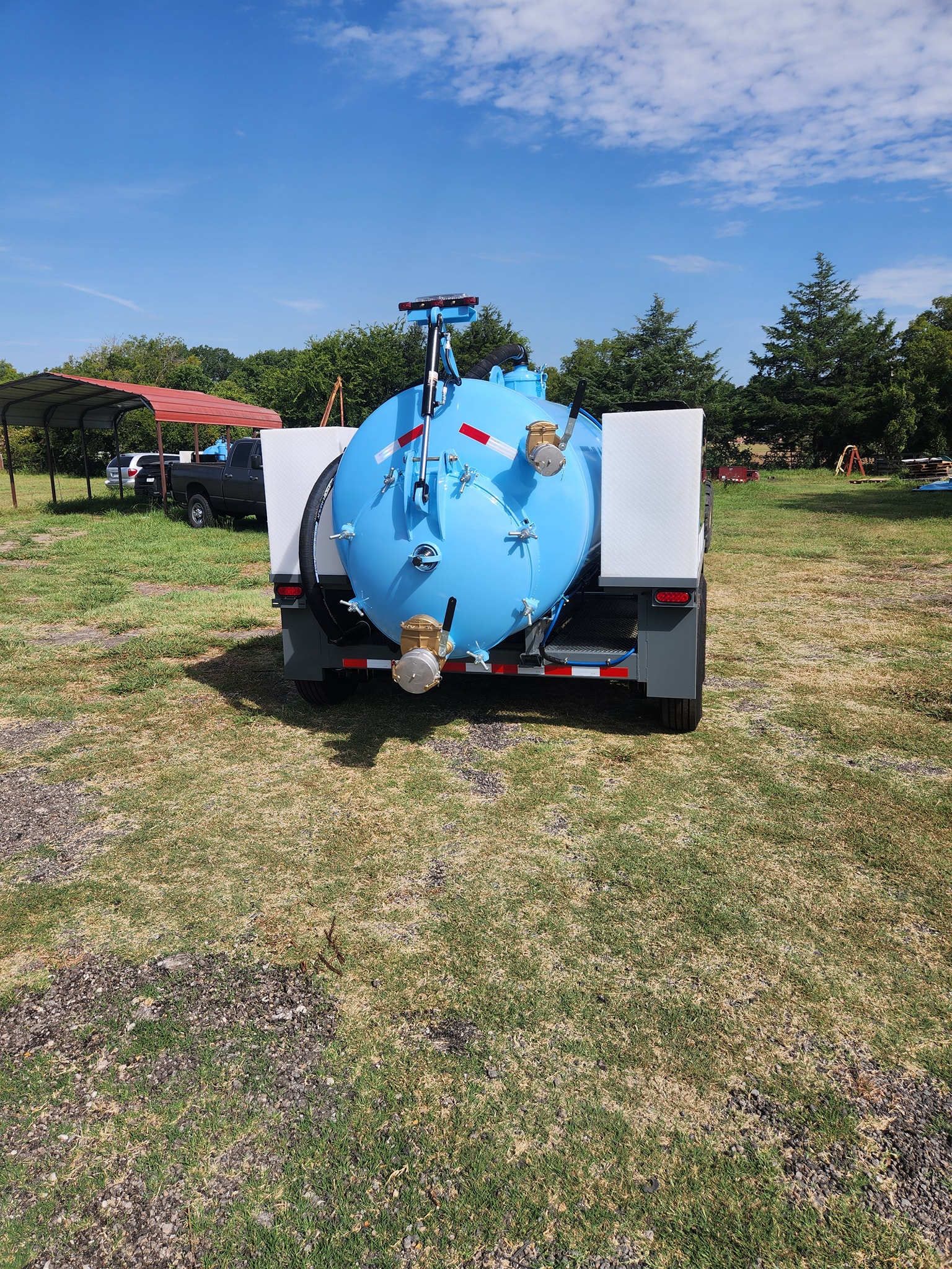 Blue-Gray Vacuum Trailer